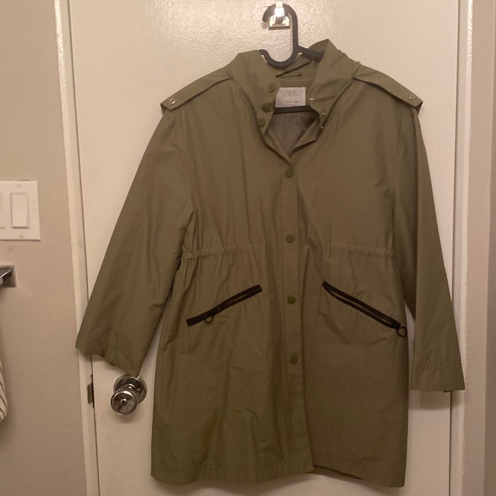 green raincoat